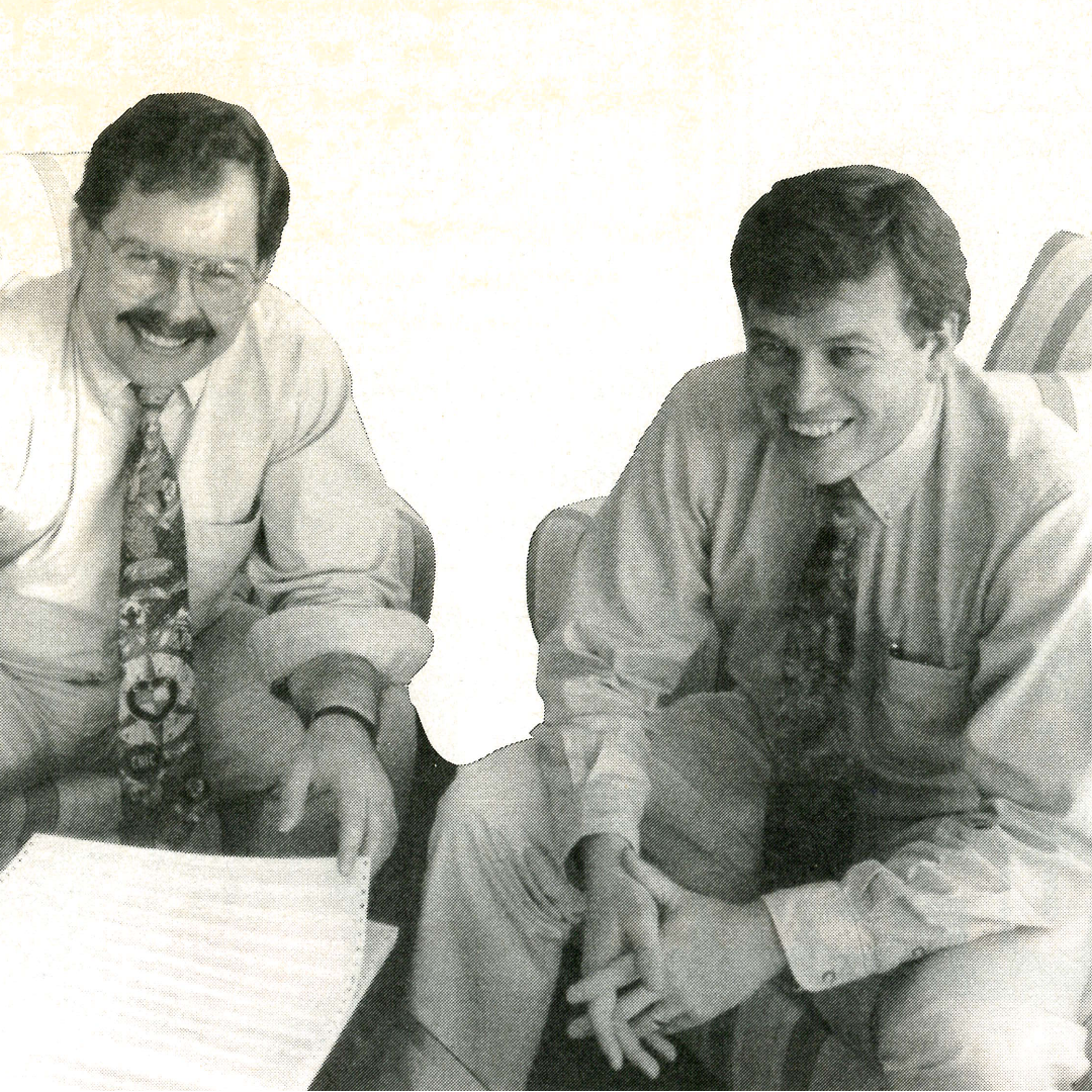 A Black and White photo printed in a ad, of Benny Kjaer(left), founder, and Soren Thomsen(right), Current CEO.