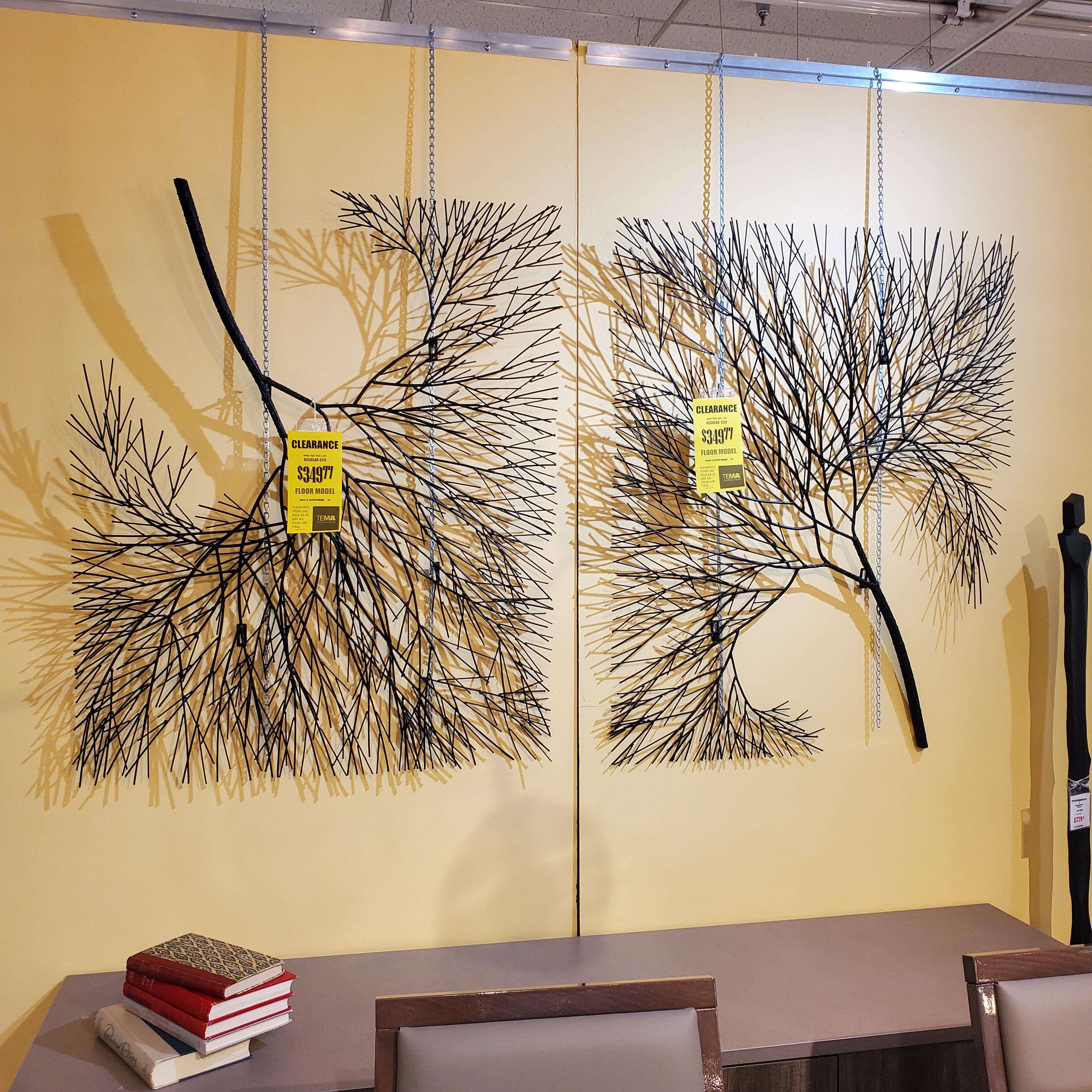 Wire Tree Wall Art Hanging on Yellow Wall in Showroom